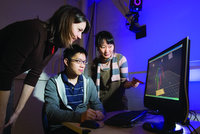 students working at a computer