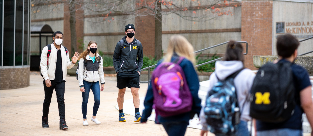 masked students on campus